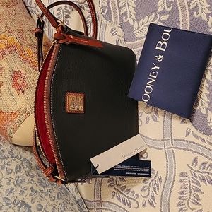 Midnight Blue Dooney & Bourke crossbody; 9x4 inches wide, 6 inches deep